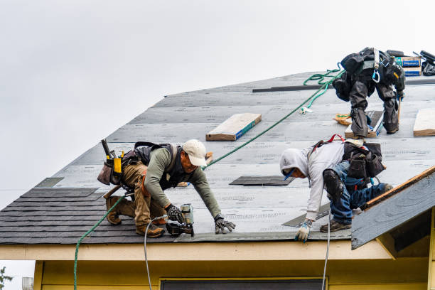 Professional Roofing technician working in Highland Lake, NY